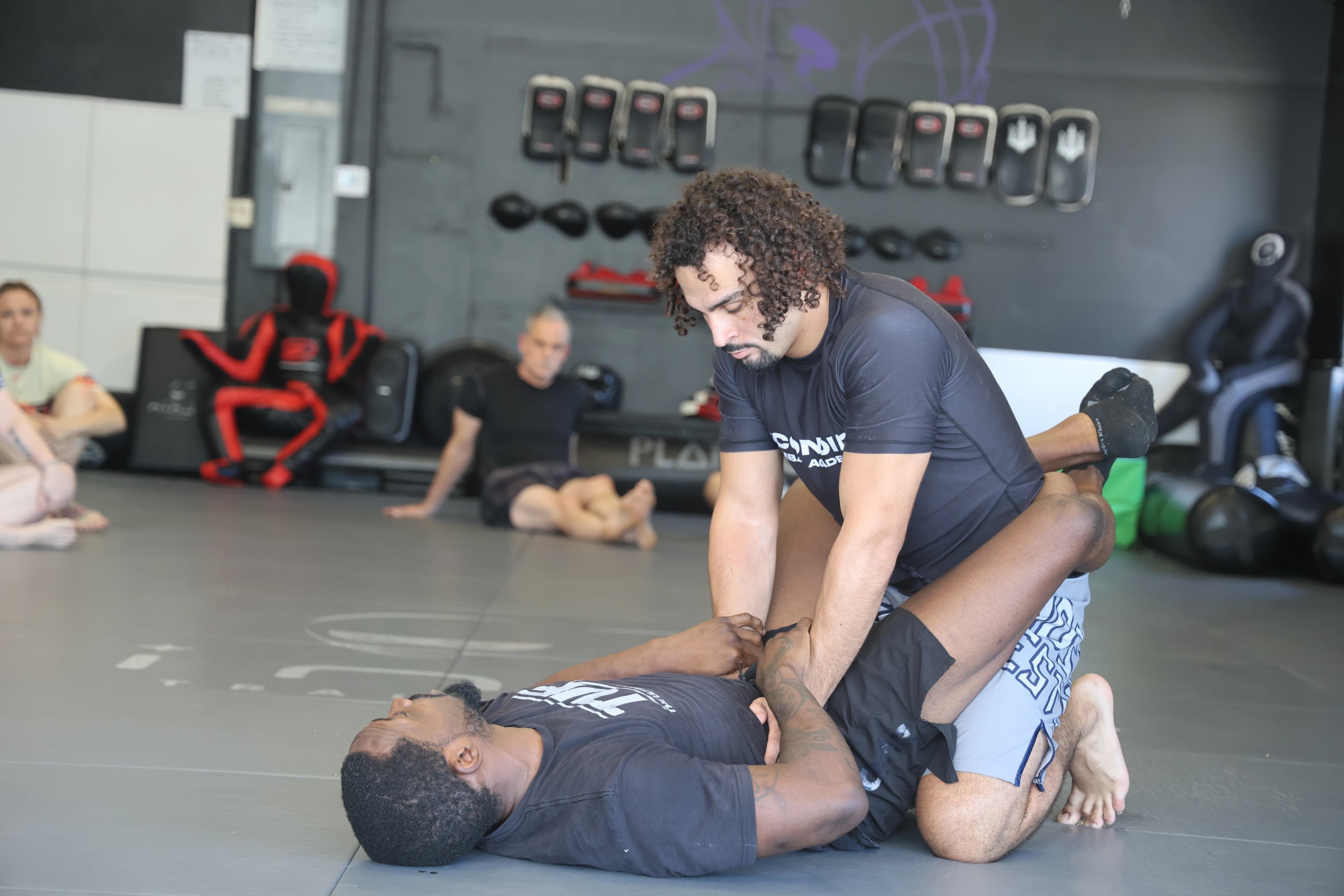 Students training No-Gi Jiu-Jitsu during sparring session