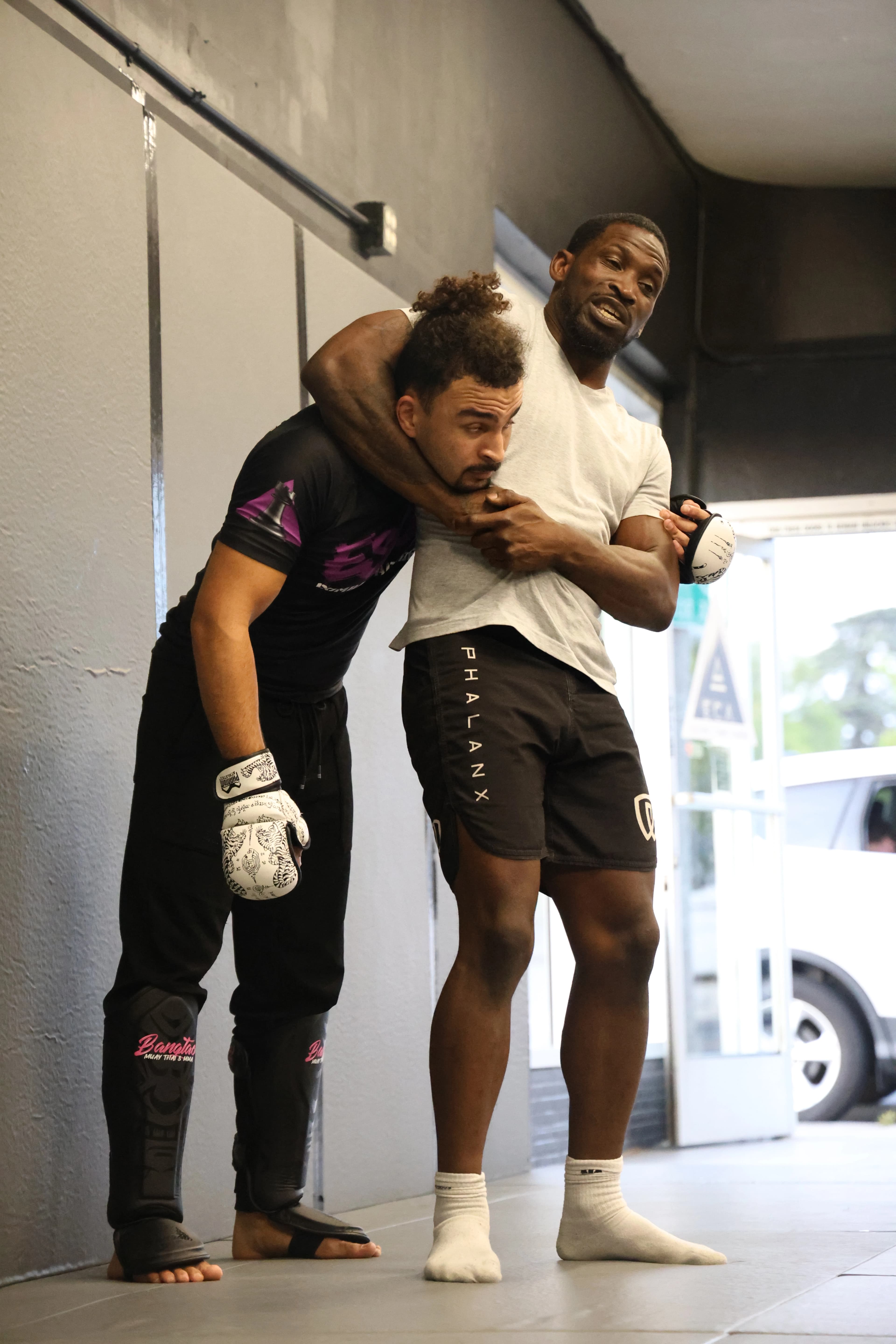 Mixed martial arts training session with sparring