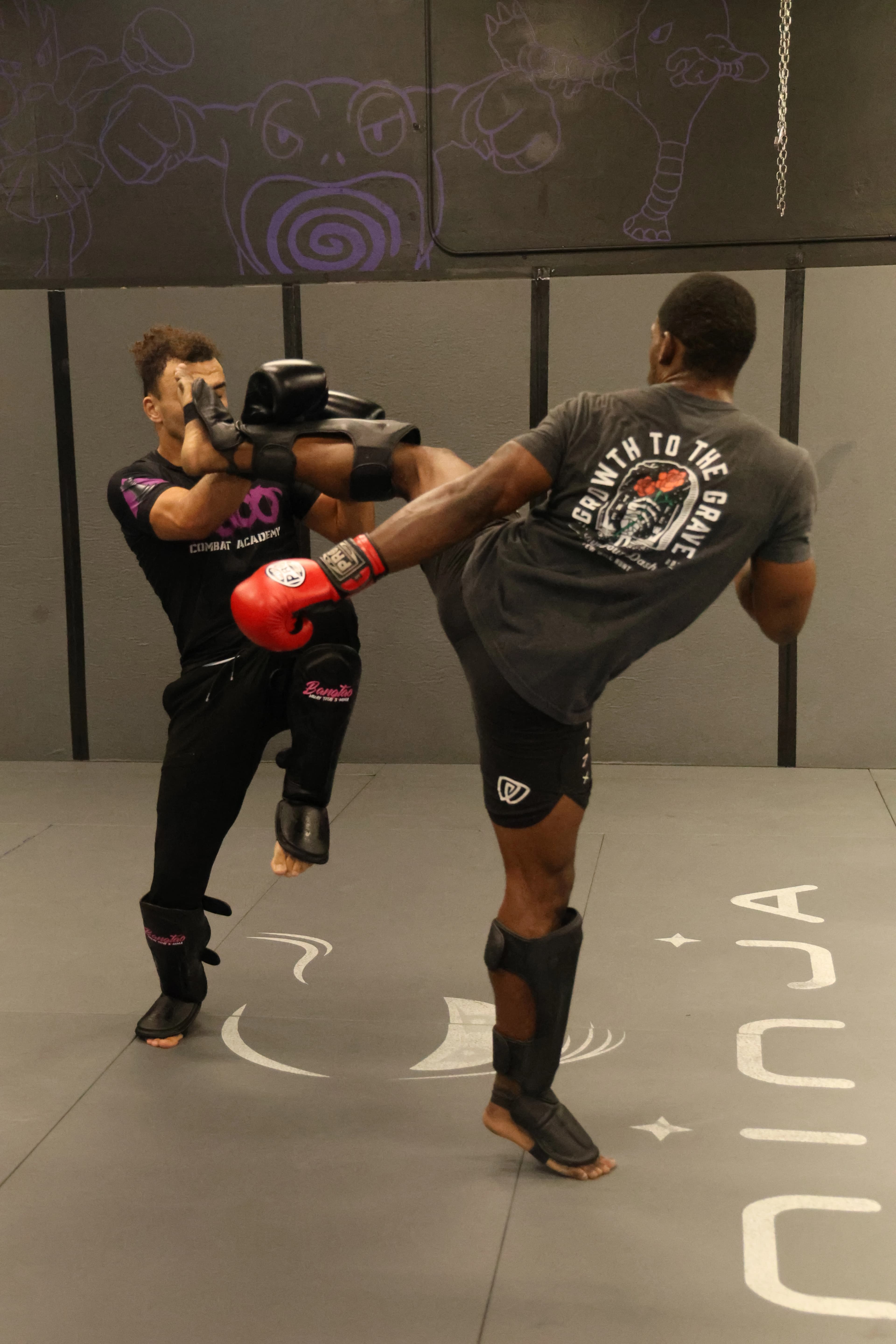 Students learning Muay Thai striking techniques