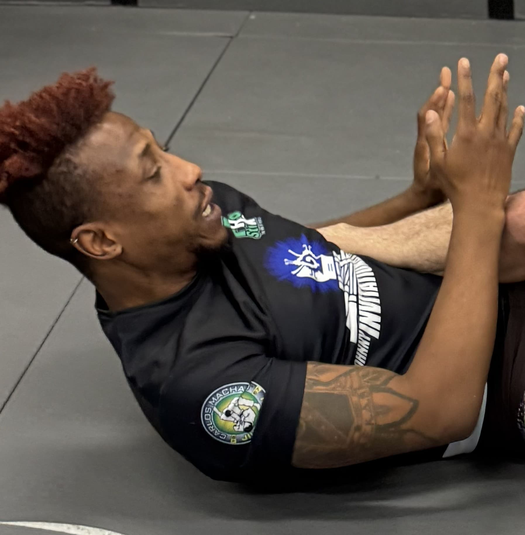 Coach Kyle Chambers demonstrating No-Gi Jiu-Jitsu technique